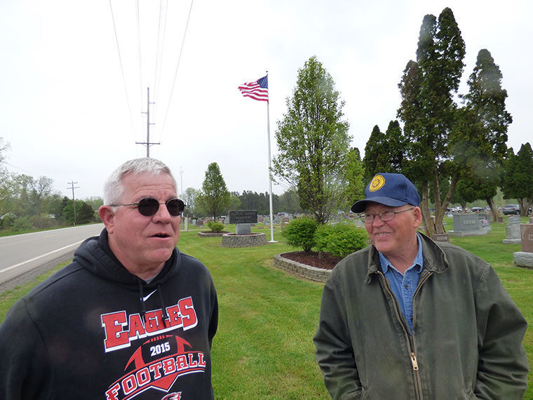 Flag poles erected at Floral Grove in time for Memorial Day